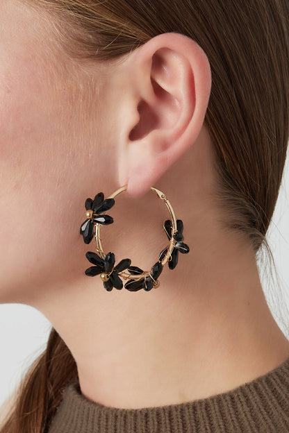 Flowering rings oorbellen beige