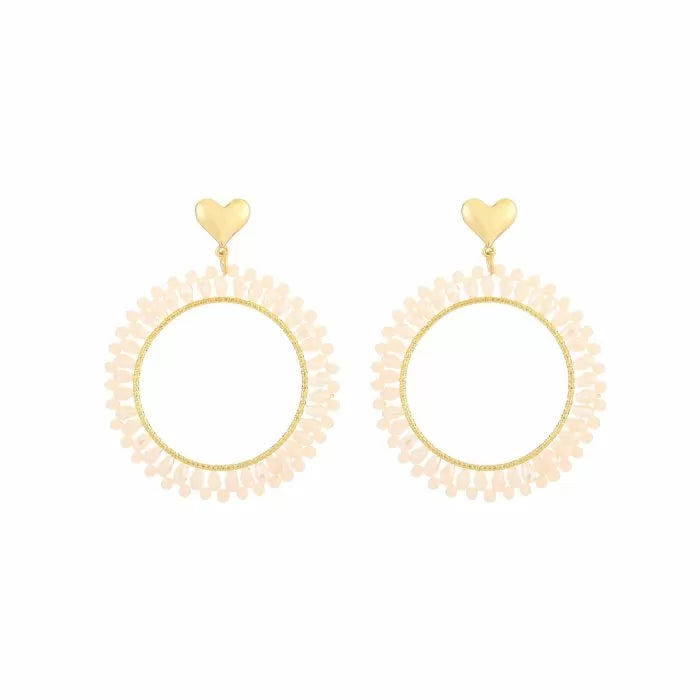 Statement oorbellen rond hart beige