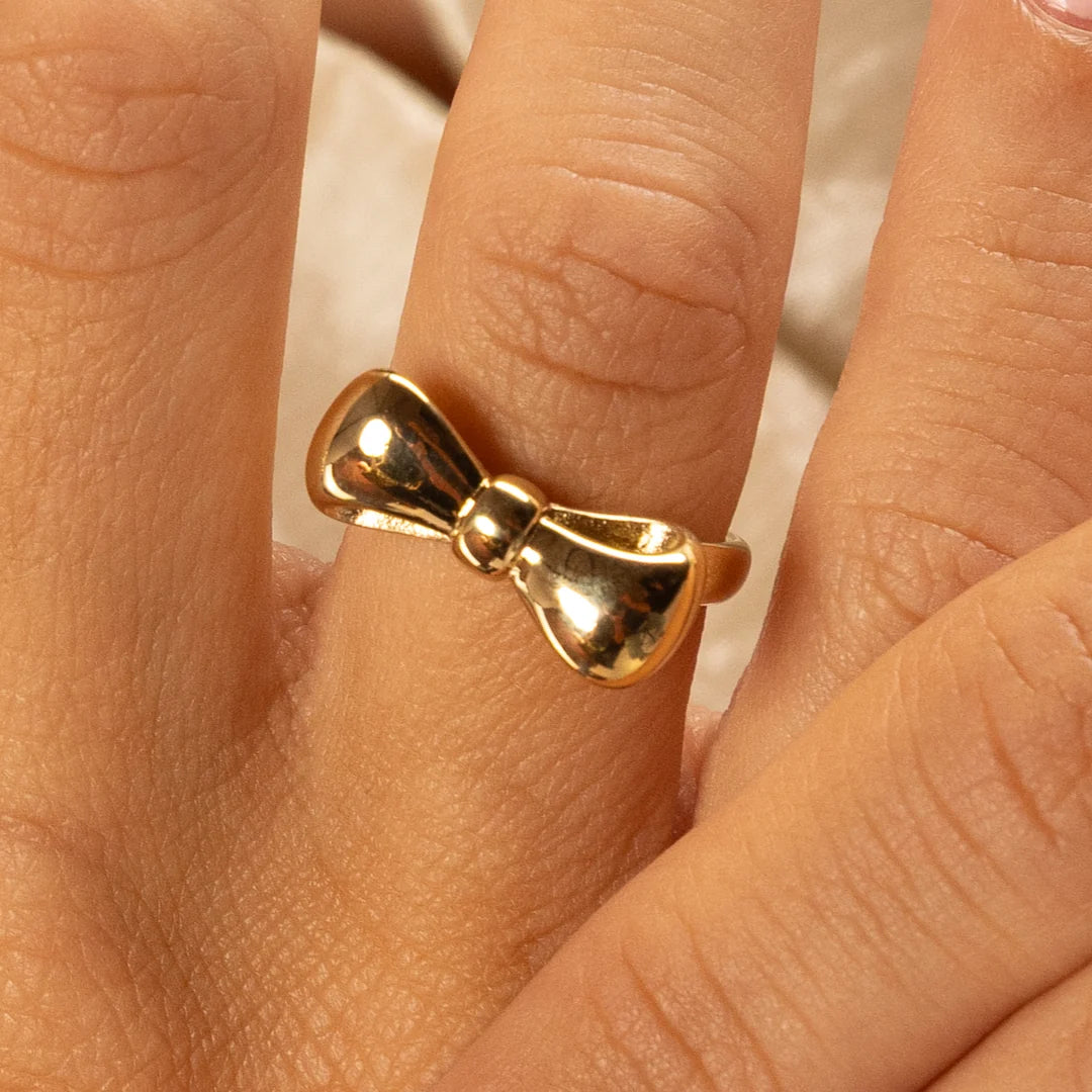 Gouden ring met strik